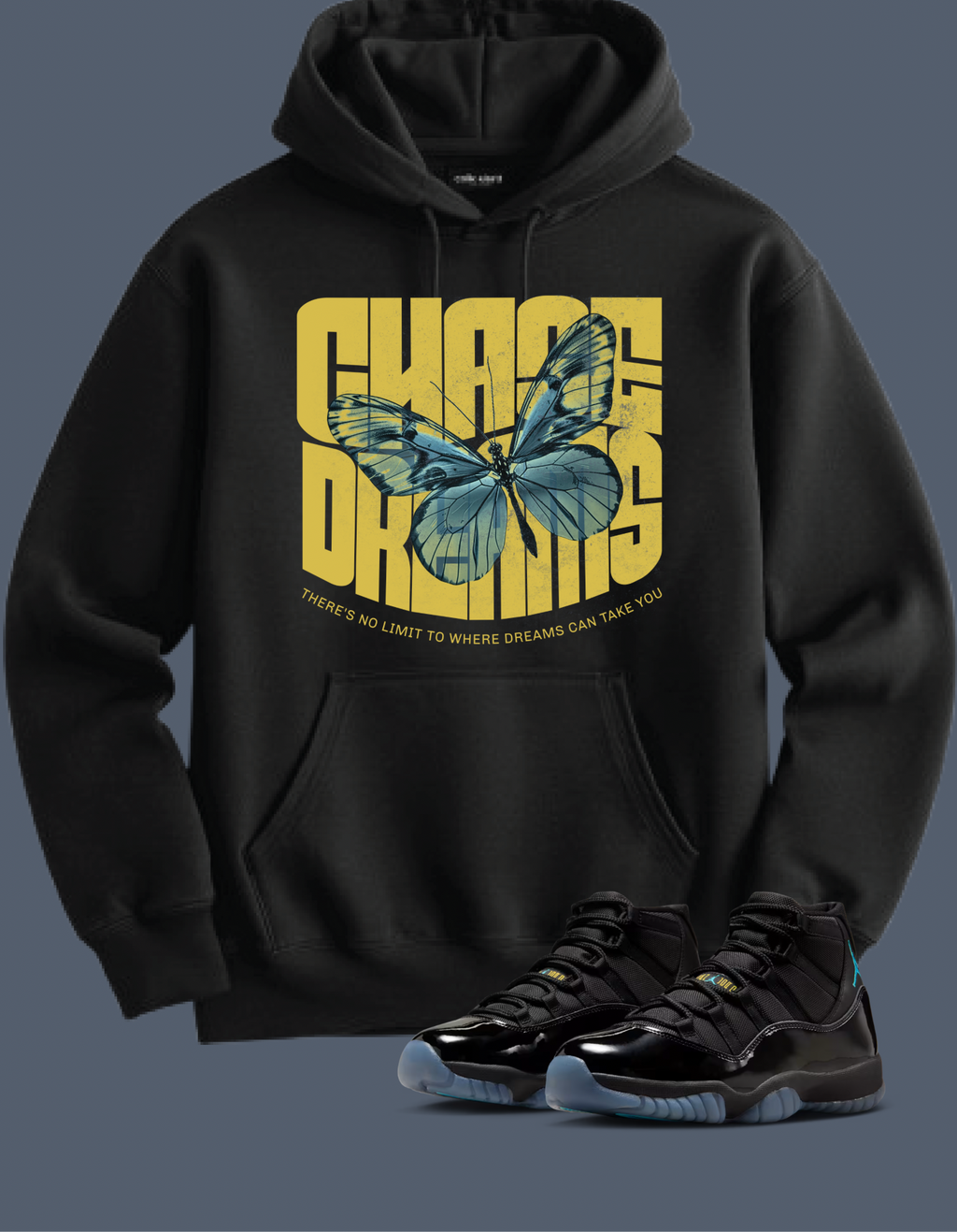 Black hoodie with butterfly graphic and text, Chase Dreams, paired with black sneakers on a gray background