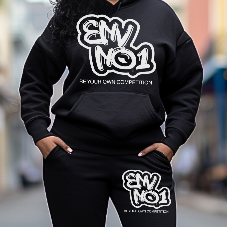 Black hoodie and pants set with 'ENVNO1' text worn by a person, blurred background