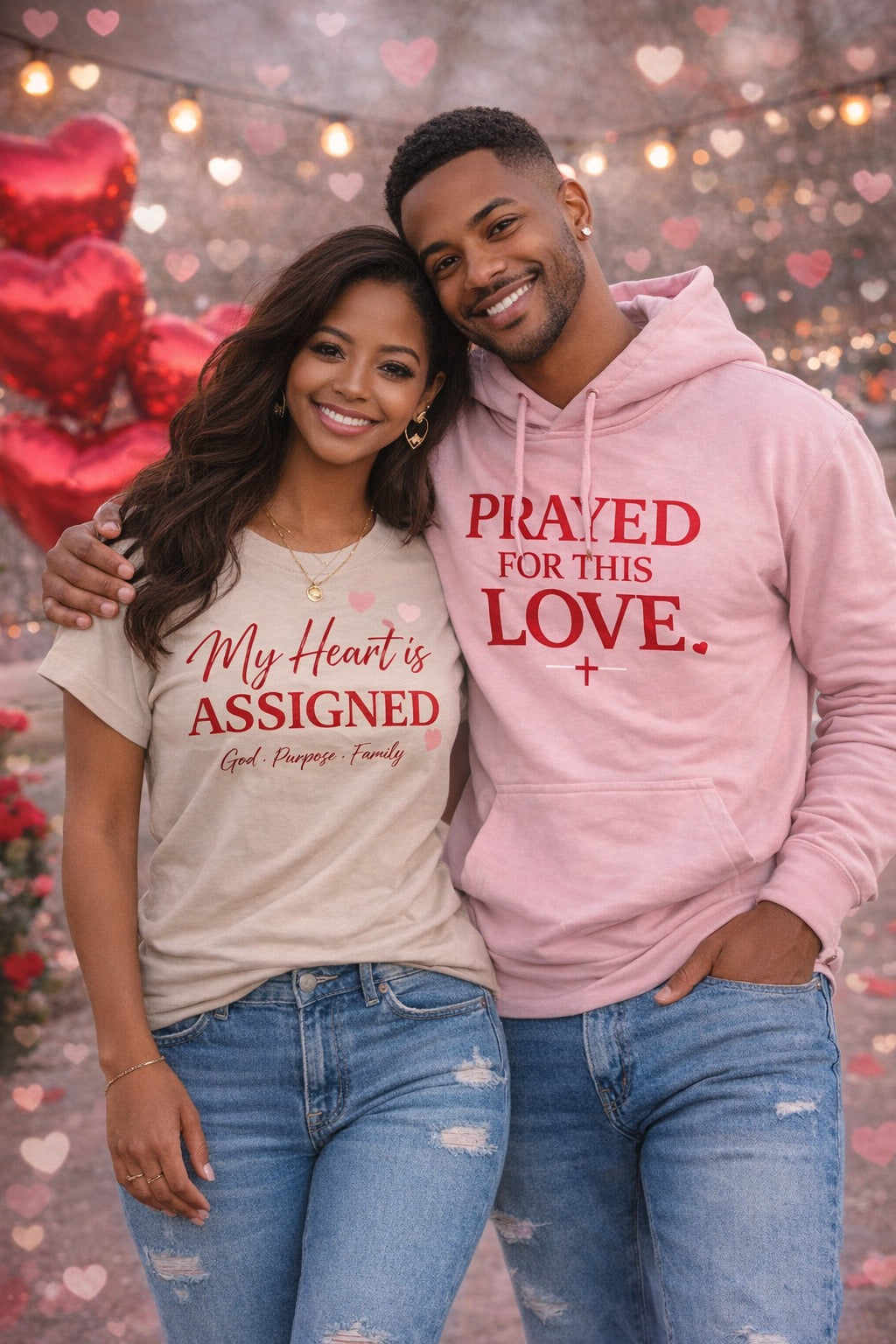 Couple wearing matching shirts with romantic text against a heart-themed background