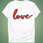 White t-shirt with red 'love' text on a green background with black rhinestone outline